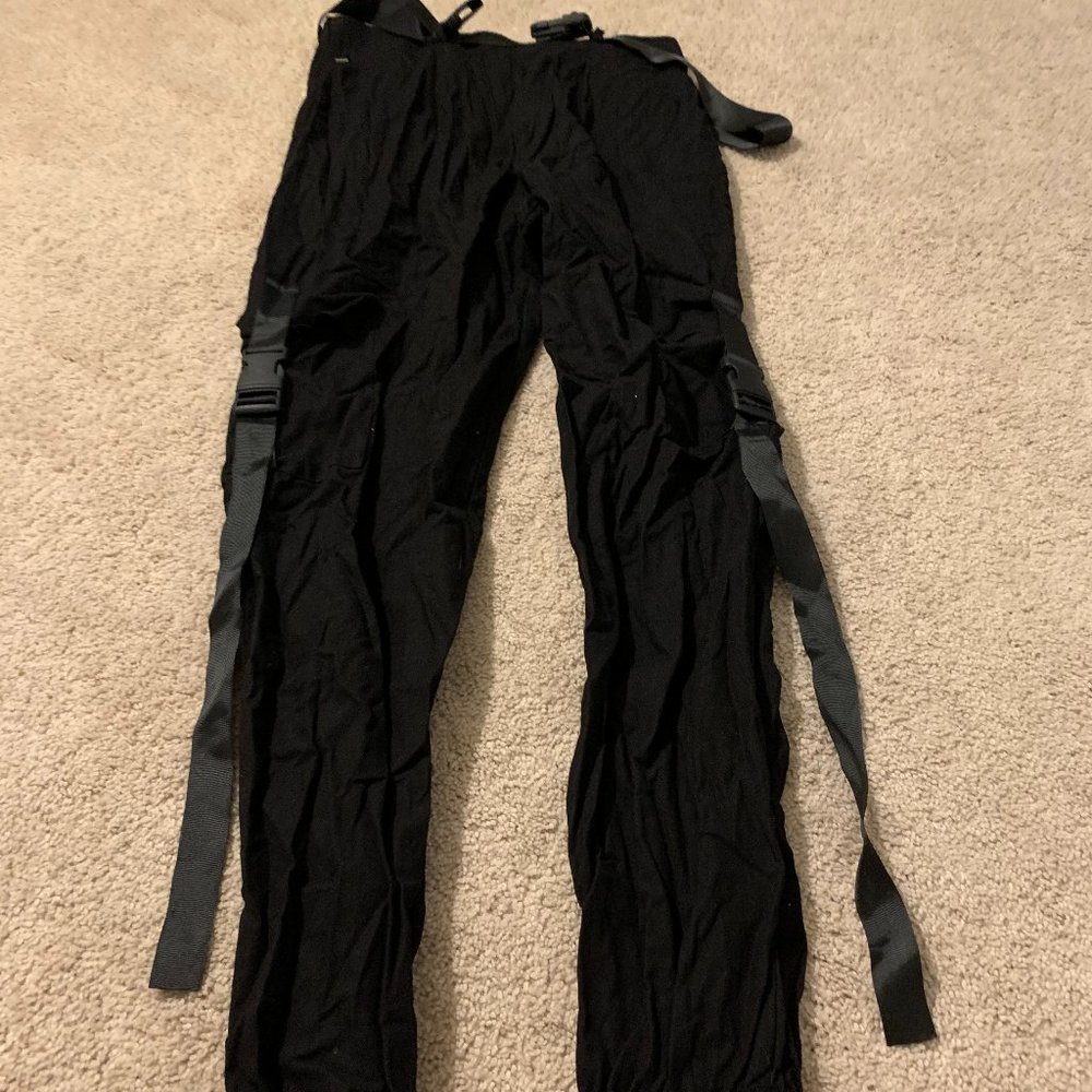 Black harem pants w buckles.